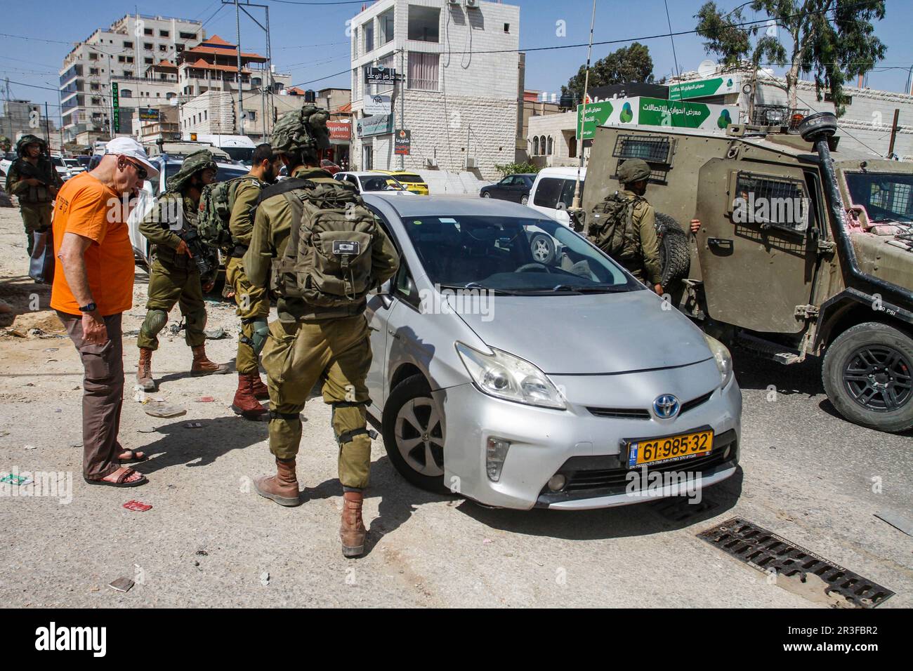 Youth Throw Stones at Settler Vehicle in Awarta, Southeast Nablus