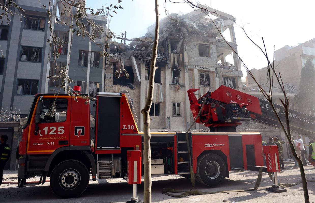 Rescue Workers Respond to Missile Strike in South Tehran